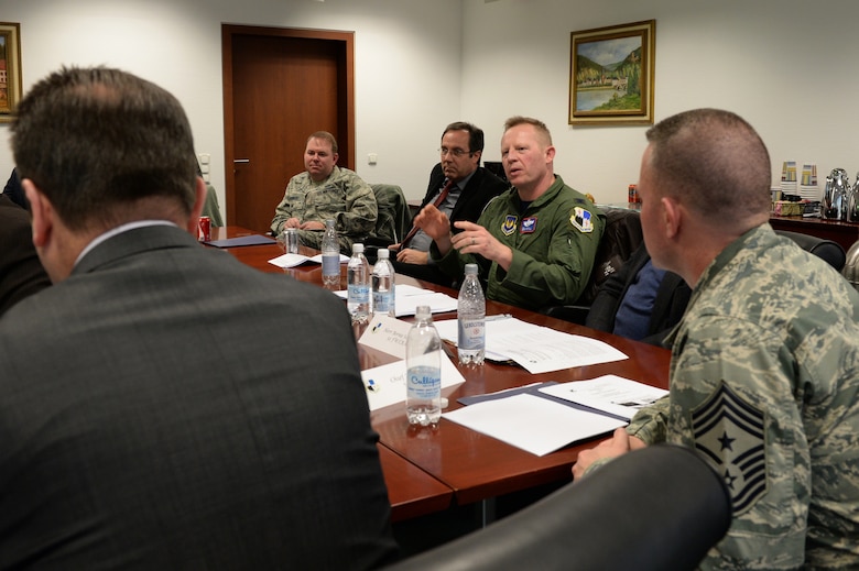 U.S. Air Force Col. Joe McFall, 52nd Fighter Wing commander, speaks during an information forum Feb. 20, 2015, at Spangdahlem Air Base, Germany. More than 20 local leaders attended the forum, which provides a way for local community leaders to discuss upcoming base projects with base leadership. (U.S. Air Force photo by Senior Airman Dylan Nuckolls/Released)