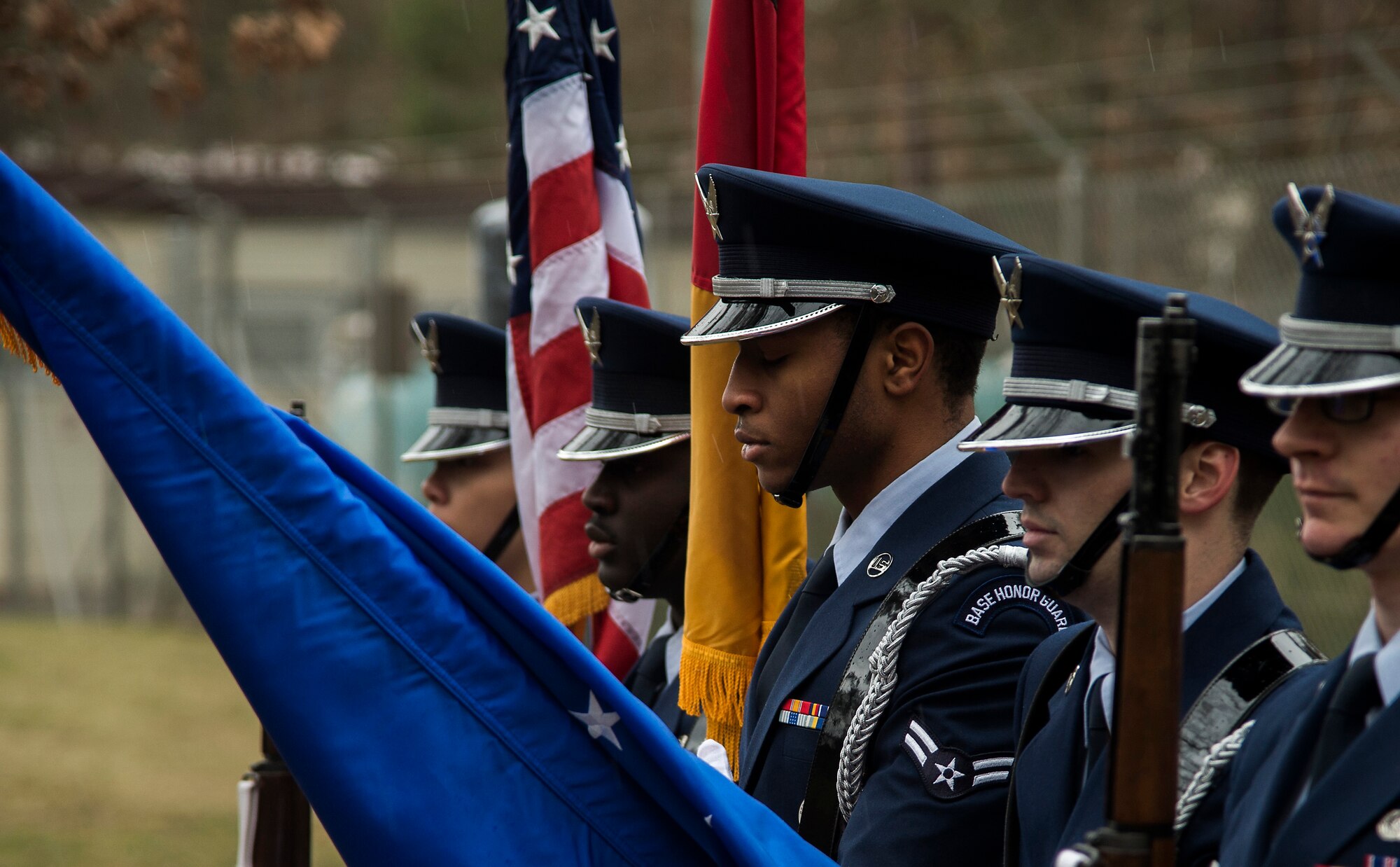 The Ramstein Honor Guard presents the colors during a memorial ceremony held for Sano, 86th Security Forces Squadron military working dog at Ramstein Air Base, Germany, Feb. 24, 2015. Sano served with the 86th SFS for seven years as an explosive ordnance detection K-9, conducting over 300,000 hours of detection throughout the Kaiserslautern Military Community. (U.S. Air Force photo/Senior Airman Damon Kasberg)