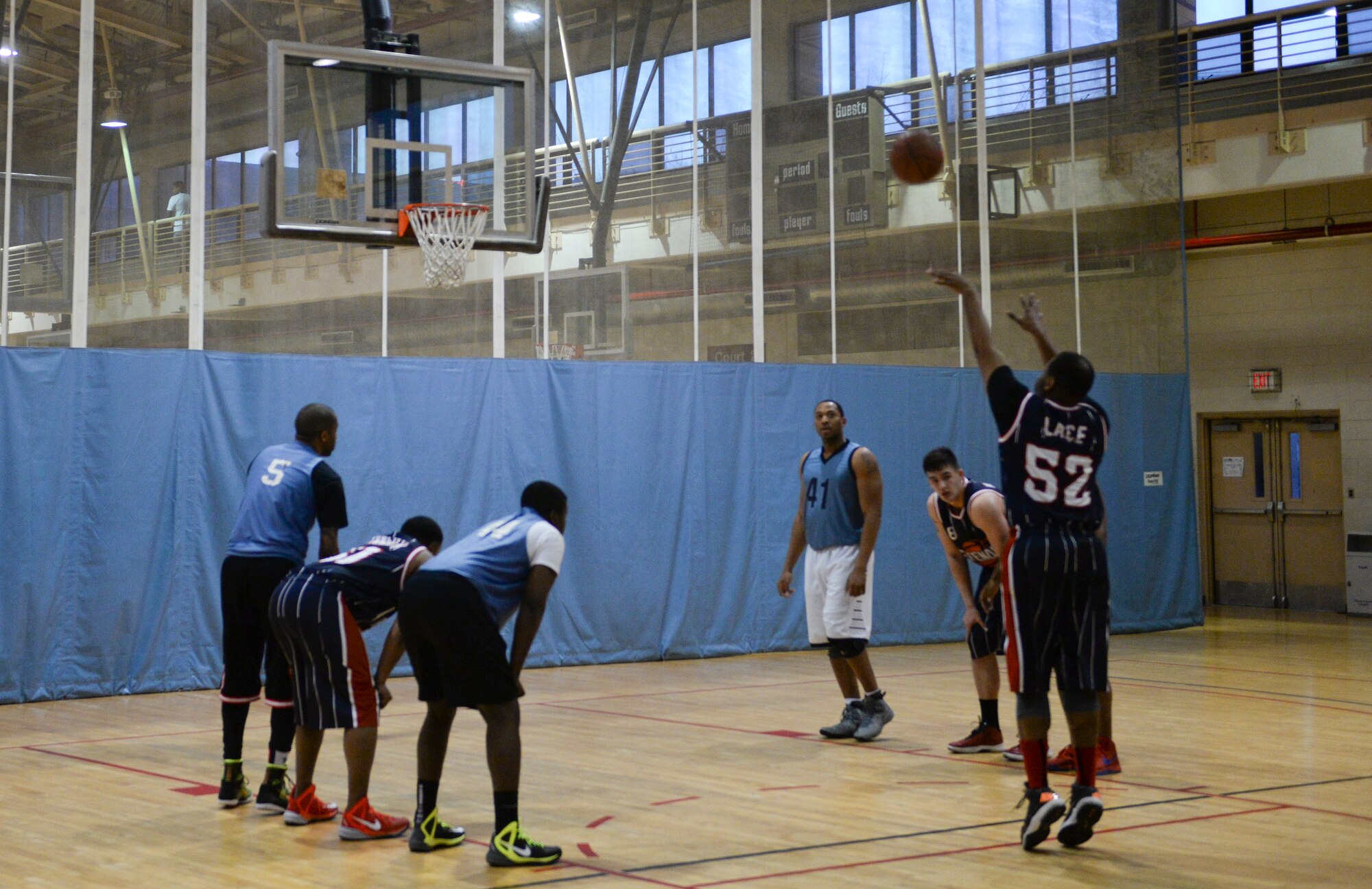 Mercedes Lacy, 51st Security Forces Squadron, shoots a free throw during the first half of an intramural basketball game Feb. 24, 2015, at Osan Air Base, Republic of Korea. Lacy made the second of the two free throws. (U.S. Air Force photo by Senior Airman David Owsianka)