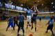 Jarrett McCalister, 51st Force Support Squadron, blocks the shot of Dillan Knott, 51st Security Forces Squadron, during the first half of an intramural basketball game Feb. 24, 2015, at Osan Air Base, Republic of Korea. FSS scored 18 of their 43 points in the first half. (U.S. Air Force photo by Senior Airman David Owsianka)