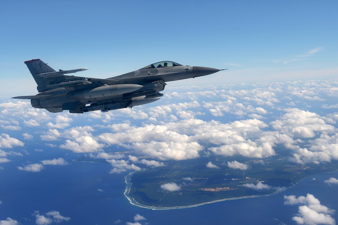 A U.S. Air Force F-16 Fighting Falcon from the 14th Fighter Squadron flies along the coastline of Guam, Feb. 17, 2015, before joining an aircraft formation for an exercise during Cope North 15.