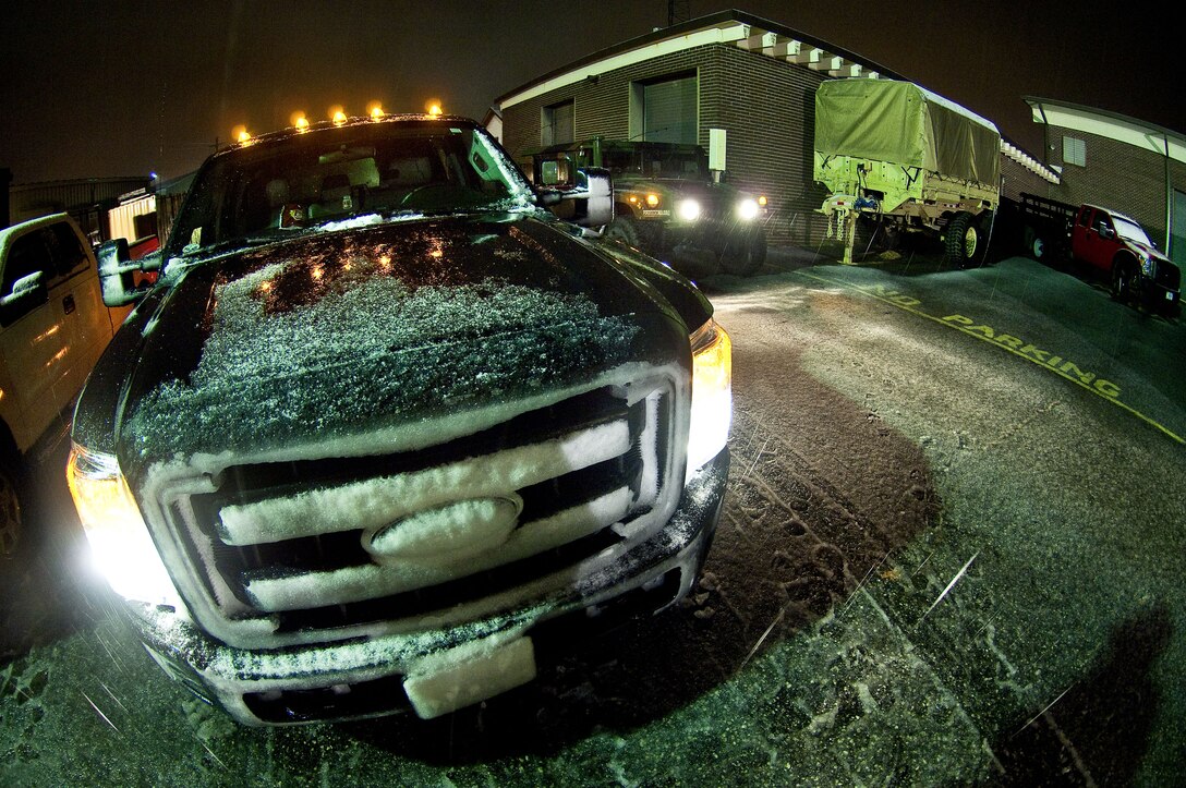 A South Carolina Army National Guard wrecker team waits to help motorists along a highway in Greenville, S.C., Feb. 25, 2015.