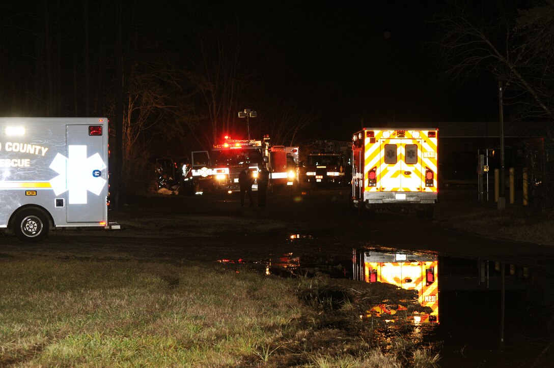 Emergency crews and vehicles from Marine Corps Base Quantico and Stafford Country participate in a nighttime emergency drill at the Methods of Entry School aboard MCBQ on Dec. 18. 
