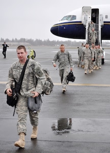 The first group of Soldiers with the 41st Infantry Brigade Combat Team of the Oregon Army National Guard arrived at McChord Air Force Base, Wash., April 3, 2010. About 120 Soldiers returned after their nearly 12-month deployment to Iraq. The 2,700 Soldiers with the 41st IBCT are expected to arrive at Fort Lewis, Wash., in the next few weeks, where they will go through medical review and out-processing before returning to Oregon for their demobilization ceremonies scheduled for later this month.