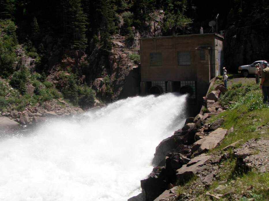 “The Platoro Reserovir Outlet Works on the Conejos River, a tributary to the Rio Grande, in Colorado. The maximum release from outlet works is approximately 1,000 cubic feet per second (cfs). Highest computed inflow this year (2014) was 500-700 cfs.” Photo by Amy Louise, July 23, 2014.