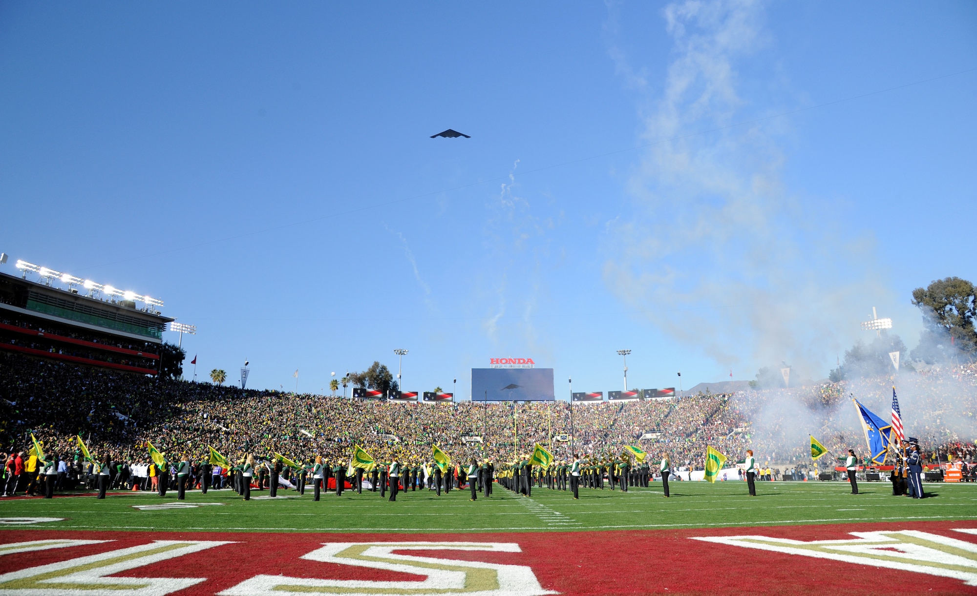 A B-2 Spirit stealth bomber from Whiteman Air Force Base, Mo., flies over the Rose Bowl Stadium during the 101st Rose Bowl Game Jan. 1, 2015, in Pasadena, Calif. The game was attended by more than 90,000 fans and viewed on television by more than 28 million viewers. (U.S. Air Force photo by Staff Sgt. Brigitte N. Brantley/Released)