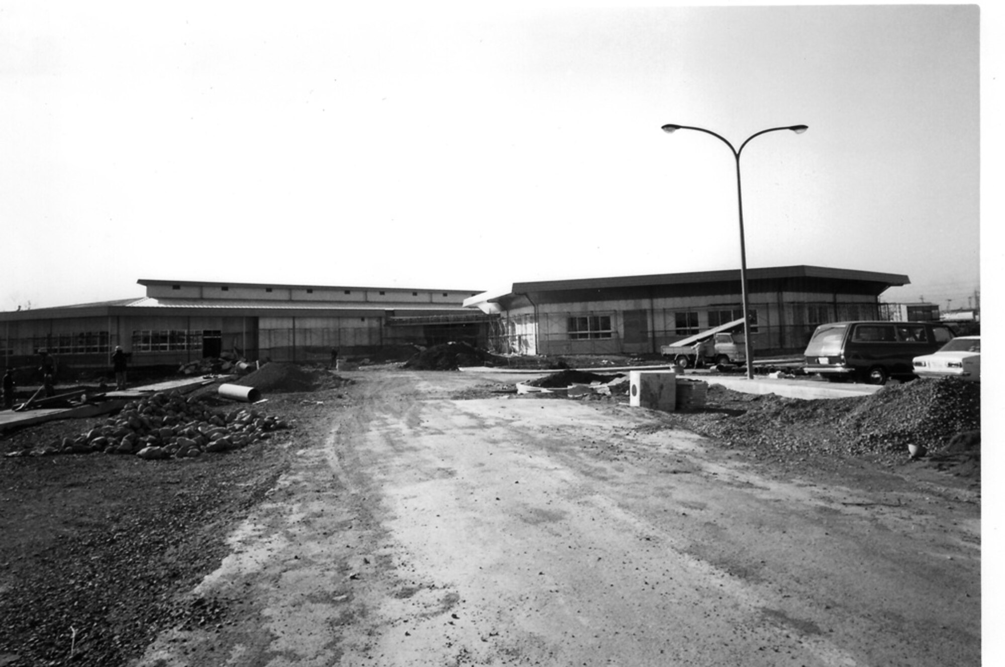 Yokota High School and Yokota Middle School were also KPCP projects. Here
is an April 1973 view of the high school still under construction. (Photo courtesy of the 374th 
Airlift Wing History Office)

