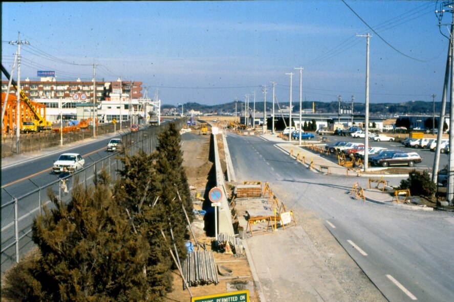 A 1980s photo of northwest Yokota along Route 16 when that busy road was
still two lanes. This image shows a section of Yokota's land that was
released for the road-widening project whose ground-breaking ceremony
occurred in December 1979. (Photo courtesy of the 374th 
Airlift Wing History Office)
