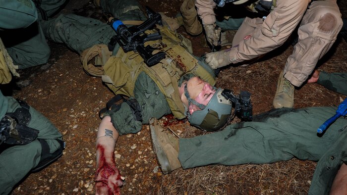 The high-risk training conducted at the Methods of Entry School aboard Marine Corps Base Quantico necessitates regular emergency response training. On Dec. 18 the school conducted a nighttime emergency response exercise involving corspmen, firefighters and paramedics from Quantico, and a medical aircrew and helicopter from Manassas.