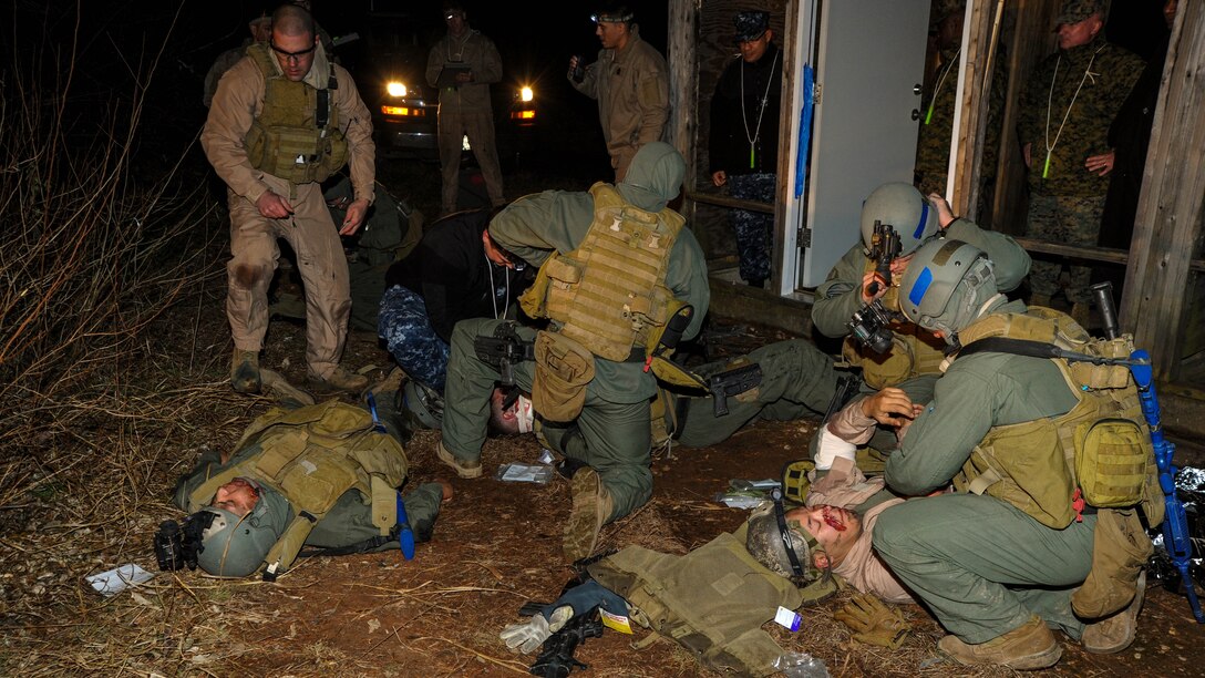 The high-risk training conducted at the Methods of Entry School aboard Marine Corps Base Quantico necessitates regular emergency response training. On Dec. 18 the school conducted a nighttime emergency response exercise involving corspmen, firefighters and paramedics from Quantico, and a medical aircrew and helicopter from Manassas.