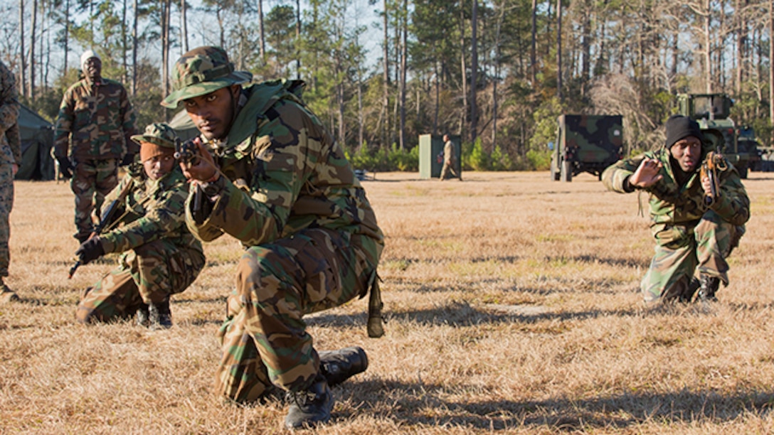African role players rehearse combat drills aboard Marine Corps Base Camp Lejeune, N.C., Dec. 11, 2014. More than 80 Marines with Marine Wing Support Squadron 272 and 2nd Battalion, 8th Marine Regiment taught military tactics and built camaraderie with role players in preparation for an upcoming deployment with Special-Purpose Marine Air-Ground Task Force Crisis Response-Africa.