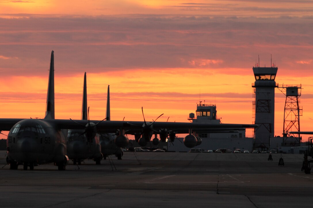 Several kC-130J Super Hercules aerial refueler aircraft with Marine Aerial Refueler Transport Squadron 252 sit staged on the flight line at Marine Corps Air Station Cherry Point, N.C., Jan. 5, 2015, as the Air Traffic Control Tower rises in the background. 
Cherry Point is home to 2nd Marine Aircraft Wing and several of its squadrons. Its runways operate 24/7, 365 days each year, and the air station hosts squadrons that specialize in heavy helicopter lift and transport; air-to-ground attack support; electronic warfare; aerial transport and refueling; and sea and land search and rescue.
