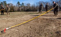 Marines with Alpha Company, 2nd Transportation Support Battalion, 2nd Marine Logistics Group, utilize Holley Sticks to search for mock improvised explosive devices during counter IED training aboard Camp Lejeune, N.C. Marines with 2nd TSB conducted the exercise to improve readiness, unit cohesion and maintain their skills for future deployments.(U.S. Marine Corps photo by Cpl. Joshua W. Brown/Released)