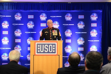 Marine Corps Sgt. Maj. Bryan B. Battaglia, senior enlisted advisor to the chairman of the Joint Chiefs of Staff, speaks during a USO reception at Navy-Marine Corps Stadium in Annapolis, Md., Dec. 27. Battaglia participated in pre-game festivities for the 2014 Military Bowl.