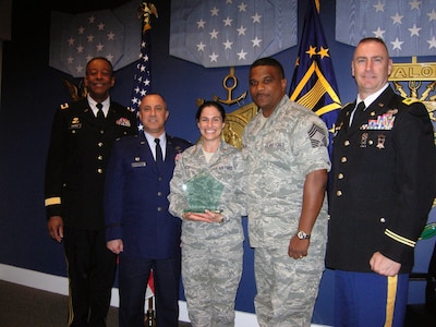 From left to right: Army Maj. Gen. Joseph C. Carter, the adjutant general of the Massachusetts National Guard; Air Force Col. Peter Green, the chief of staff of the Massachusetts Air Guard; Air Force 2nd Lt. Lori A. Alix; Air Force Chief Master Sgt. Peter Johnson, the recruiting and retention superintendant for the Massachusetts Air Guard; and Army Col. Jack Hammond, the chief of staff of the Massachusetts National Guard. Alix, was named the 2010 Exceptional Sexual Assault Coordinator at an awards ceremony in the Pentagon’s Hall of Heroes April 9, 2010.