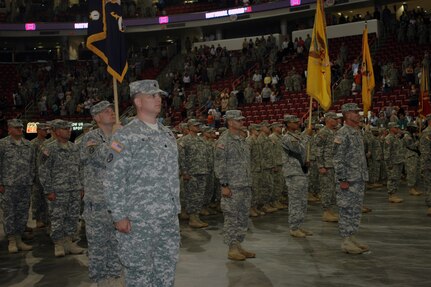 Members of the 30th Heavy Brigade Combat Team of the North Carolina National Guard stand in formation during a Welcome Home ceremony held at the RBC Center in Raleigh, N.C., April 11, 2010. The ceremony honored nearly 4,000 Soldiers and their families for their support and commitment during a nine-month deployment to Iraq.