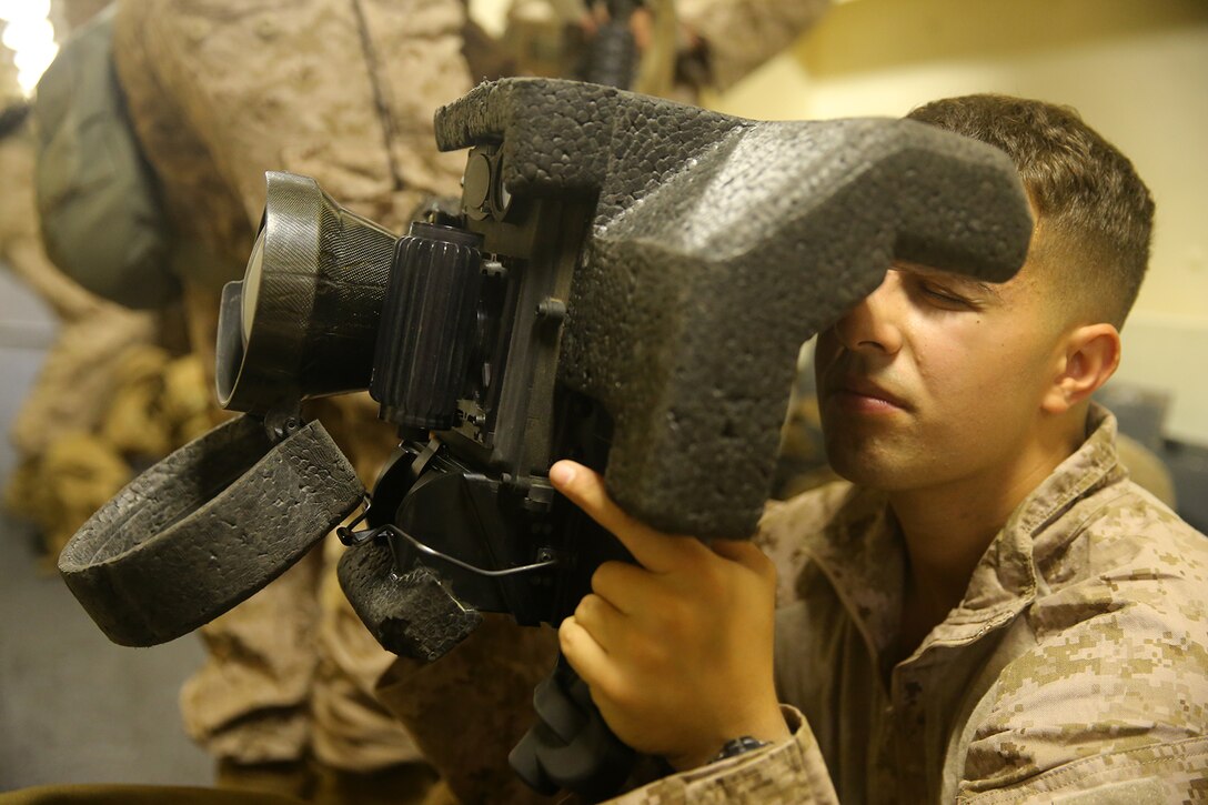 A U.S. Marine with Weapons Company, Battalion Landing Team 2nd Battalion, 1st Marines, 11th Marine Expeditionary Unit (MEU), programs a Javelin shoulder-fired anti-tank missile sight during a drill on the amphibious transport dock ship USS San Diego (LPD-22), Jan. 2, 2015. The 11th MEU is deployed with Makin Island Amphibious Ready Group as a theater reserve and crisis response force throughout U.S. Central Command and 5th Fleet area of responsibility. (U.S. Marine Corps photo by Cpl. Jonathan R. Waldman/Released)