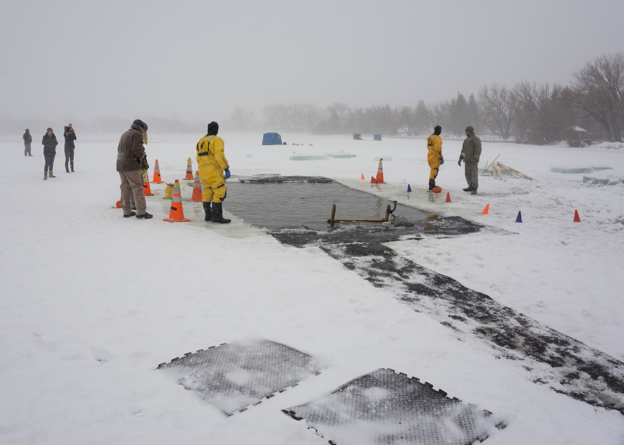 A man-made pool cut out of Sloans Lake, Cheyenne, Wyo., awaits participants of the third annual Schwartz Memorial Plunge Jan. 3, 2015. All proceeds raised from the event were donated to the EOD Warrior Foundation, which provides financial assistance and support to wounded and fallen explosive ordnance disposal warriors and their families.
 (U.S. Air Force Photo/Lan Kim)
