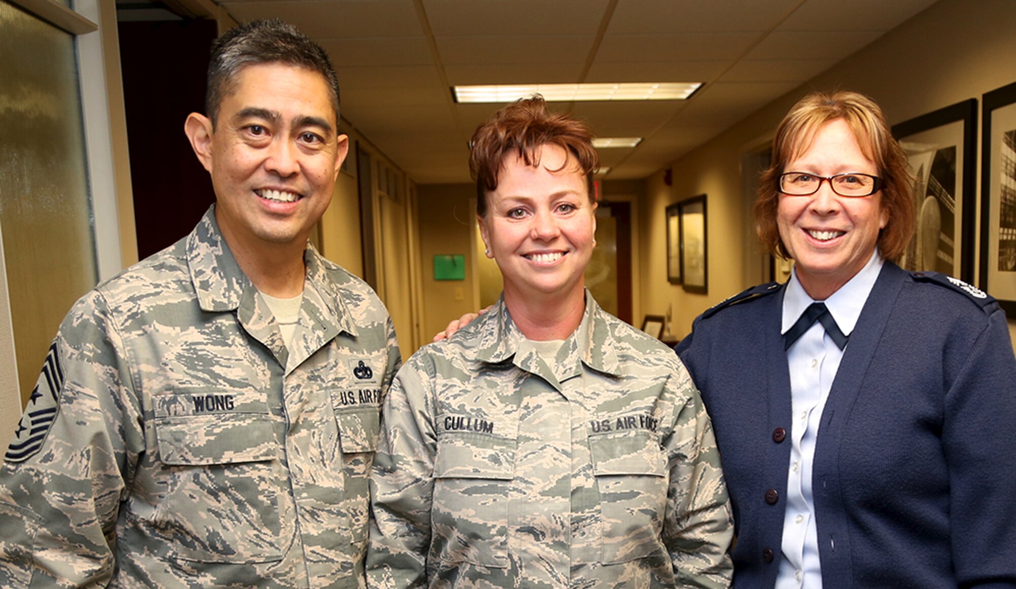 Chief Master Sergeant Brian Wong, Command Chief Master Sergeant, Fourth Air Force, talks about enlisted issues with Senior Master Sgt. Shana Cullum and Chief Master Sergeant Vicky Kuntz who is the Command Chief Master Sergeant assigned to the 932d Airlift Wing, Scott Air Force Base, Illinois. This was Chief Wong's first visit to Scott Air Force Base recently and he was able to make visits throughout the 932nd Airlift Wing.  (U.S. Air Force photo/Tech. Sgt. Christopher Parr)