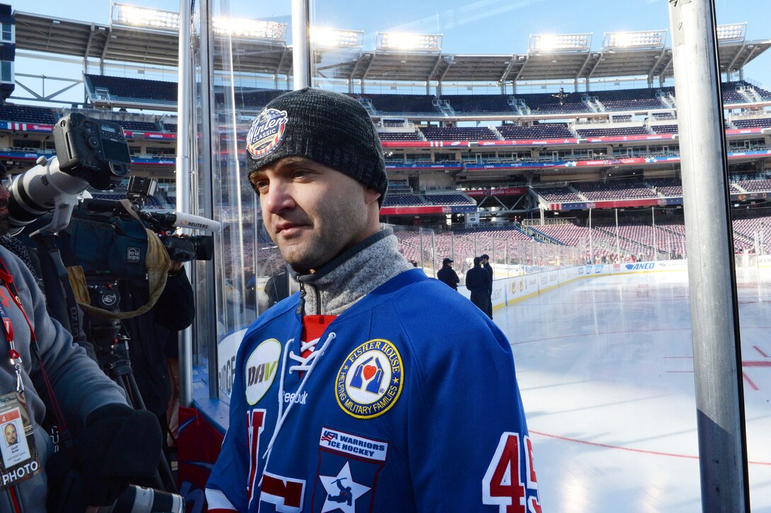 Miroslav Kazimir of the USA Warriors wounded veterans hockey team listens to an interview question during a media day for the Winter Classic 2015 at Nationals Park in Washington, D.C., Dec. 31, 2014.