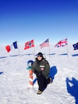 Chief Master Sgt. James W. Hotaling, the Air National Guard command chief master sergeant, poses at the geographic South Pole during a visit in November, 2014. Hotaling was there meeting deployed Airmen from the New York ANG's 109th Airlift Wing, who provide Airlift capability for the U.S. Antarctic program throughout the Antarctic continent. 