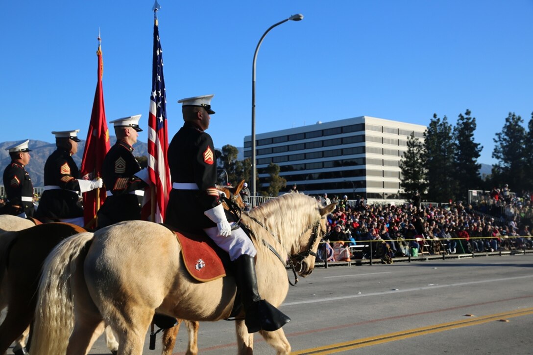 From Dec. 26 to January 1, 2015, the last remaining Marine Corps Mounted Color Guard, from Marine Corps Logistics Base Barstow, Calif., traveled to Los Angeles County to participate in the Equestrian Festival and the Rose Parade. The Marines, riding four abreast, presented colors to open up the Equestrian Festival at the Equidome – Los Angeles Equestrian Center, Dec. 29. On January 1, 2015, the base commanding officer, Col. Michael L. Scalise and base sergeant major, Sgt. Maj. Karl D. Simburger, rode in front of the MCG greeting revelers of the Rose Parade as they passed by. The MCG has participated in the Rose Parade for more than 20 years. In between events, Marines participated in community relations and maintained, cared for and rode the horses to keep themselves and the horses prepared for events. 