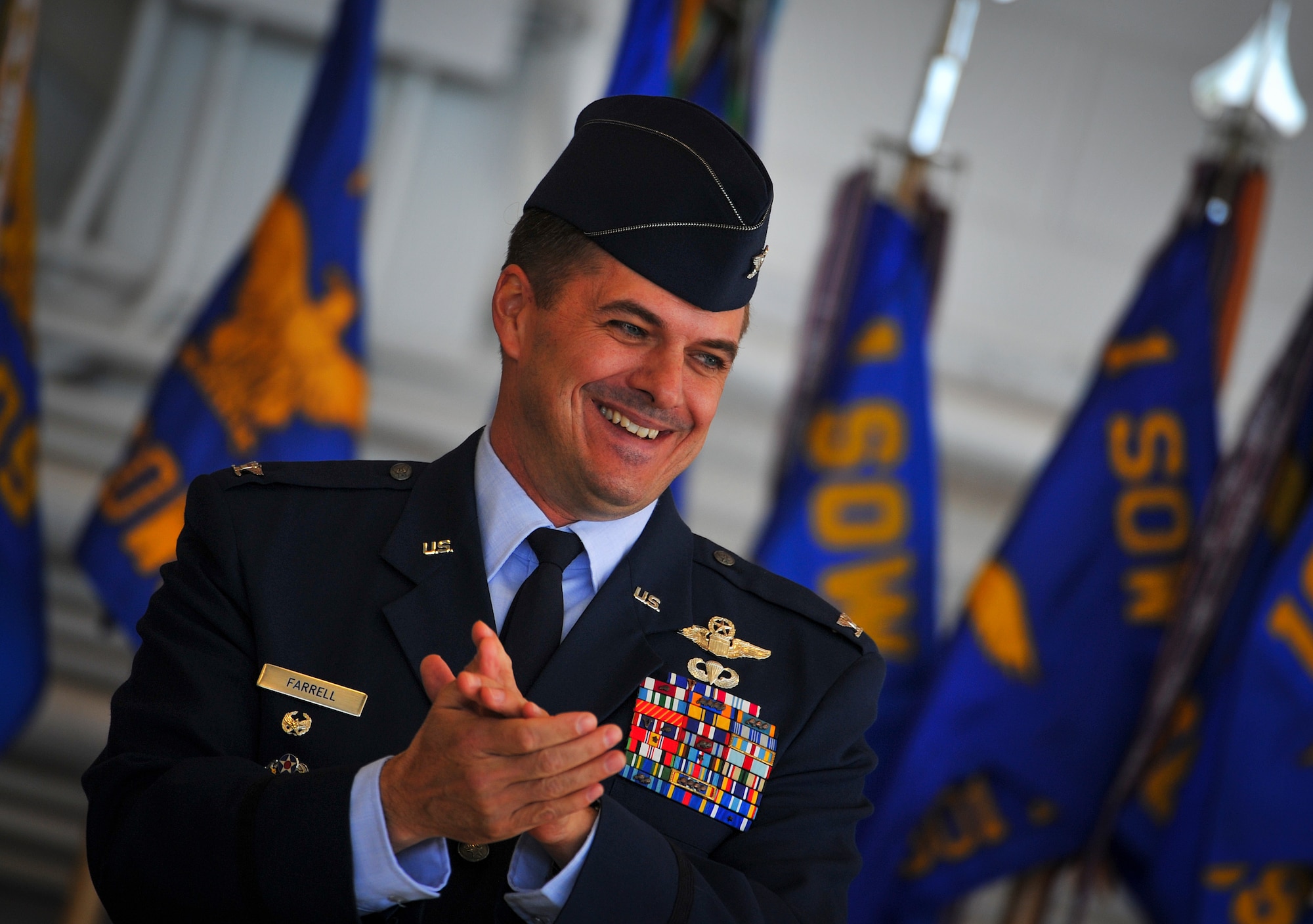 Col. Sean Farrell, 1st Special Operations Wing commander, assumes command during the 1st Special Operations Wing change of command ceremony at the Freedom Hangar on Hurlburt Field, Fla., Jan. 6, 2015. The primary mission of the 1st SOW is to rapidly plan and execute specialized and contingency operations in support of national priorities. (U.S. Air Force photo/Senior Airman Christopher Callaway)