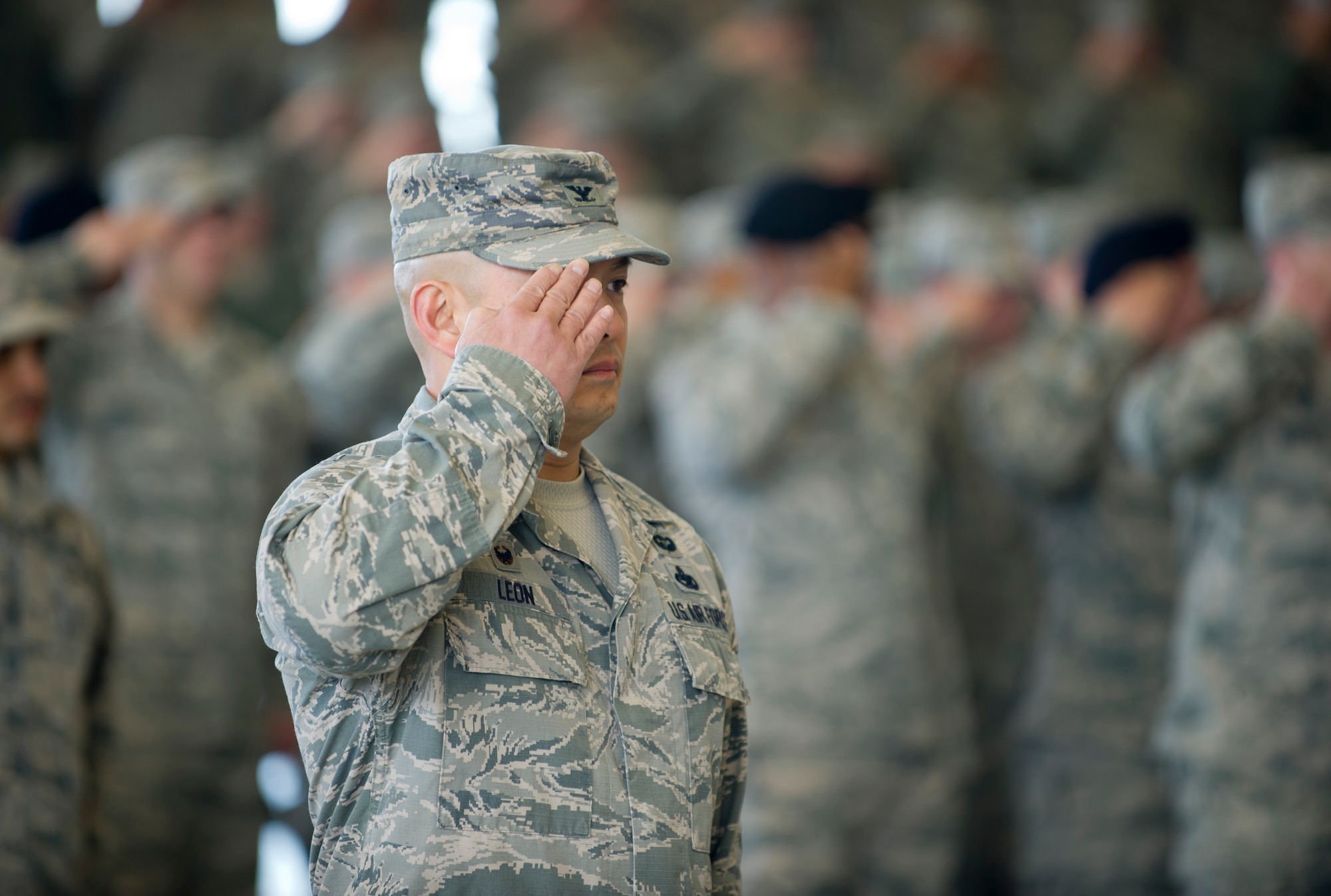 Col. Rene Leon, 1st Special Operations Maintenance Group commander, salutes during the 1st Special Operations Wing change of command at the Freedom Hangar on Hurlburt Field, Fla., Jan. 6, 2015. Col. Sean Farrell assumed command of the 1st SOW during the ceremony. (U.S. Air Force photo/Senior Airman Krystal M. Garrett)