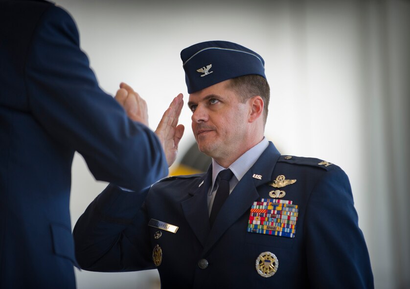 Col. Sean Farrell, 1st Special Operations Wing commander, assumes command during the 1st Special Operations Wing change of command ceremony at the Freedom Hangar on Hurlburt Field, Fla., Jan. 6, 2015. (U.S. Air Force photo/Senior Airman Krystal M. Garrett)