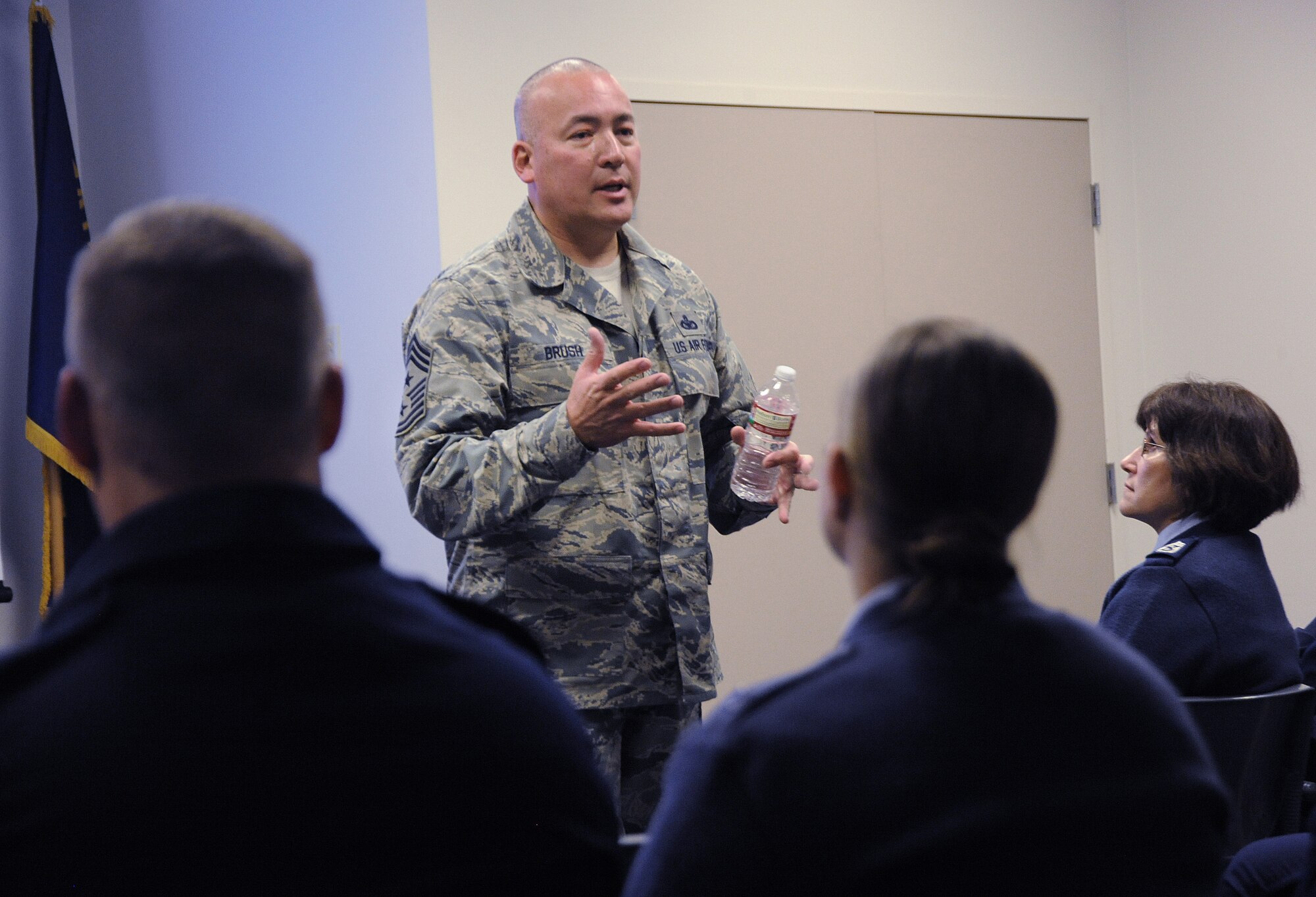 Chief Master Sgt. Mitchell O. Brush, Senior Enlisted Advisor for the National Guard Bureau leads a town hall event at the Portland Air National Guard Base, Ore., Jan. 5, 2015. During the town hall, he addressed the structure of the National Guard Bureau, ongoing changes and challenges that Soldiers and Airmen face going into the New Year. (U.S. Air National Guard photo by Tech. Sgt. John Hughel, 142nd Fighter Wing Public Affairs/Released)