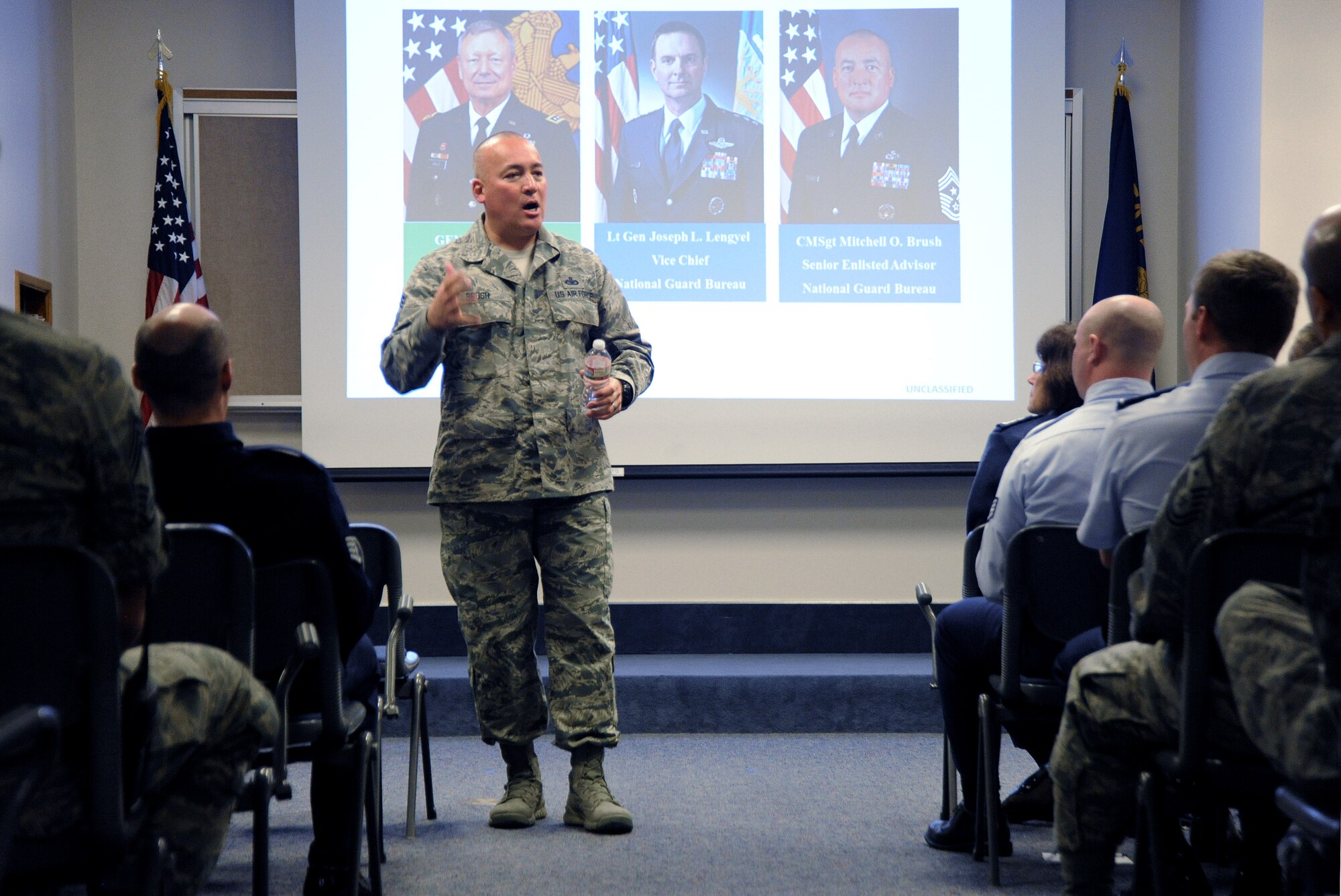 Chief Master Sgt. Mitchell O. Brush, Senior Enlisted Advisor for the National Guard Bureau leads a town hall event at the Portland Air National Guard Base, Ore., Jan. 5, 2015. During the town hall, he addressed the structure of the National Guard Bureau, ongoing changes and challenges that Soldiers and Airmen face going into the New Year. (U.S. Air National Guard photo by Tech. Sgt. John Hughel, 142nd Fighter Wing Public Affairs/Released)