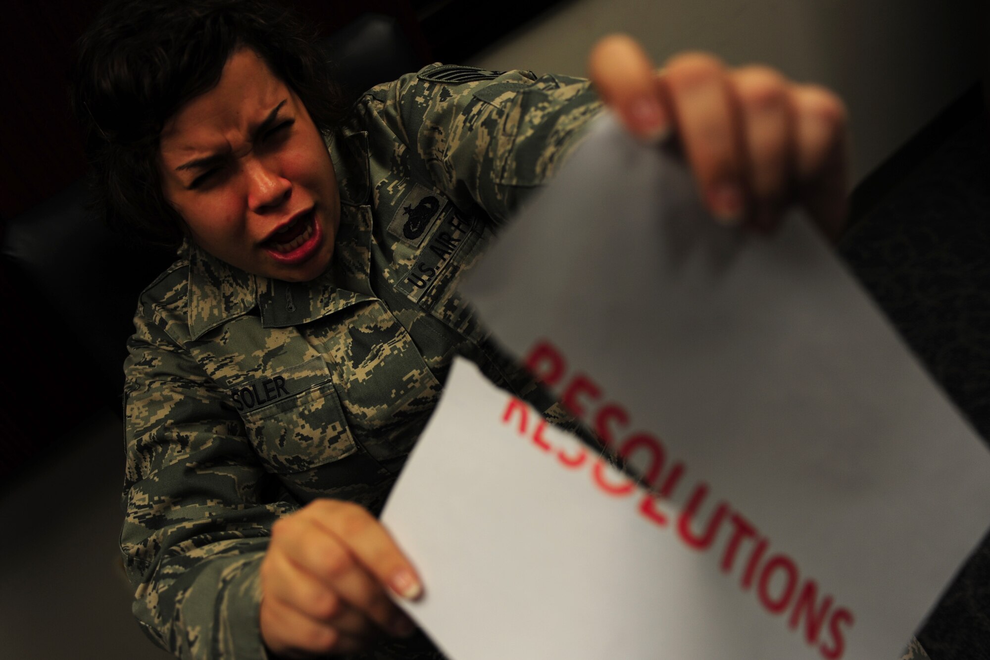 U.S. Air Force Staff Sgt. Katrina Soler, 438th Supply Chain Operations Squadron stock control supervisor, destroys paper at Langley Air Force Base, Va., Jan. 6, 2014. This New Year, Soler decided not to make any resolutions; she believes, like Christmas spirit, people should always have resolutions, and they should not only be made one time. The Rochester, N.Y., native strives to regularly create personal objectives throughout the year. (U.S. Air Force photo by Airman 1st Class Areca T. Wilson/Released) 

