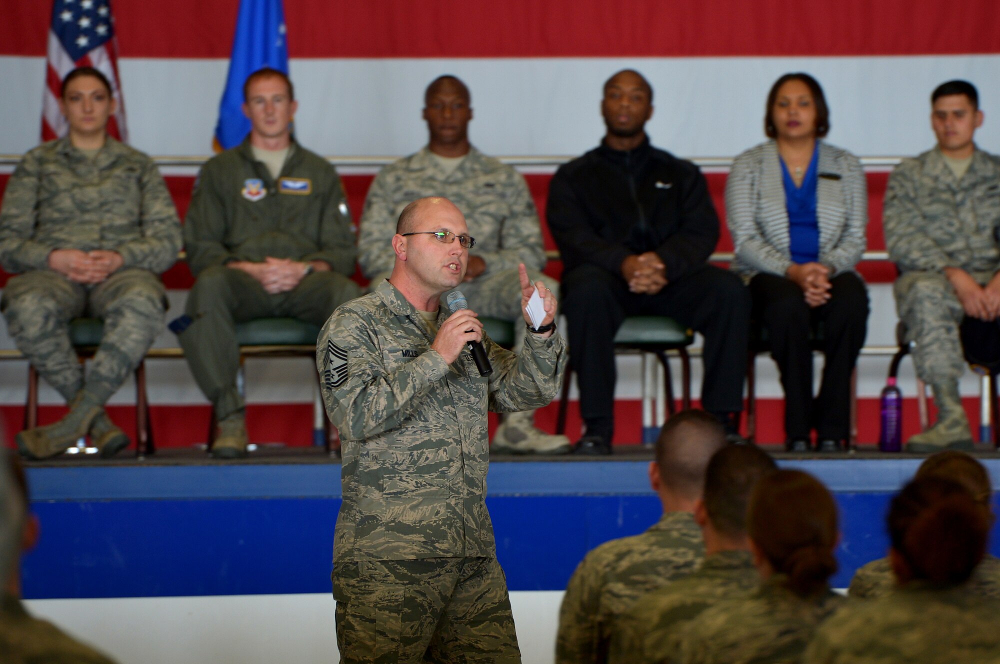 U.S. Air Force Chief Master Sgt. Charles Mills, 20th Fighter Wing command chief, speaks to 20th FW Airmen during an all-call at Shaw Air Force Base, S.C., Jan. 5, 2015. Both Mills and Col. Stephen Jost, 20th FW commander, spoke about the way forward for 2015 and unveiled a new initiative called “Airman Up,” encouraging all Airmen to continue being outstanding while striving for greater achievements in all aspects of their lives o- and off-duty. (U.S. Air Force photo by Staff Sgt. Kenny Holston/Released)
