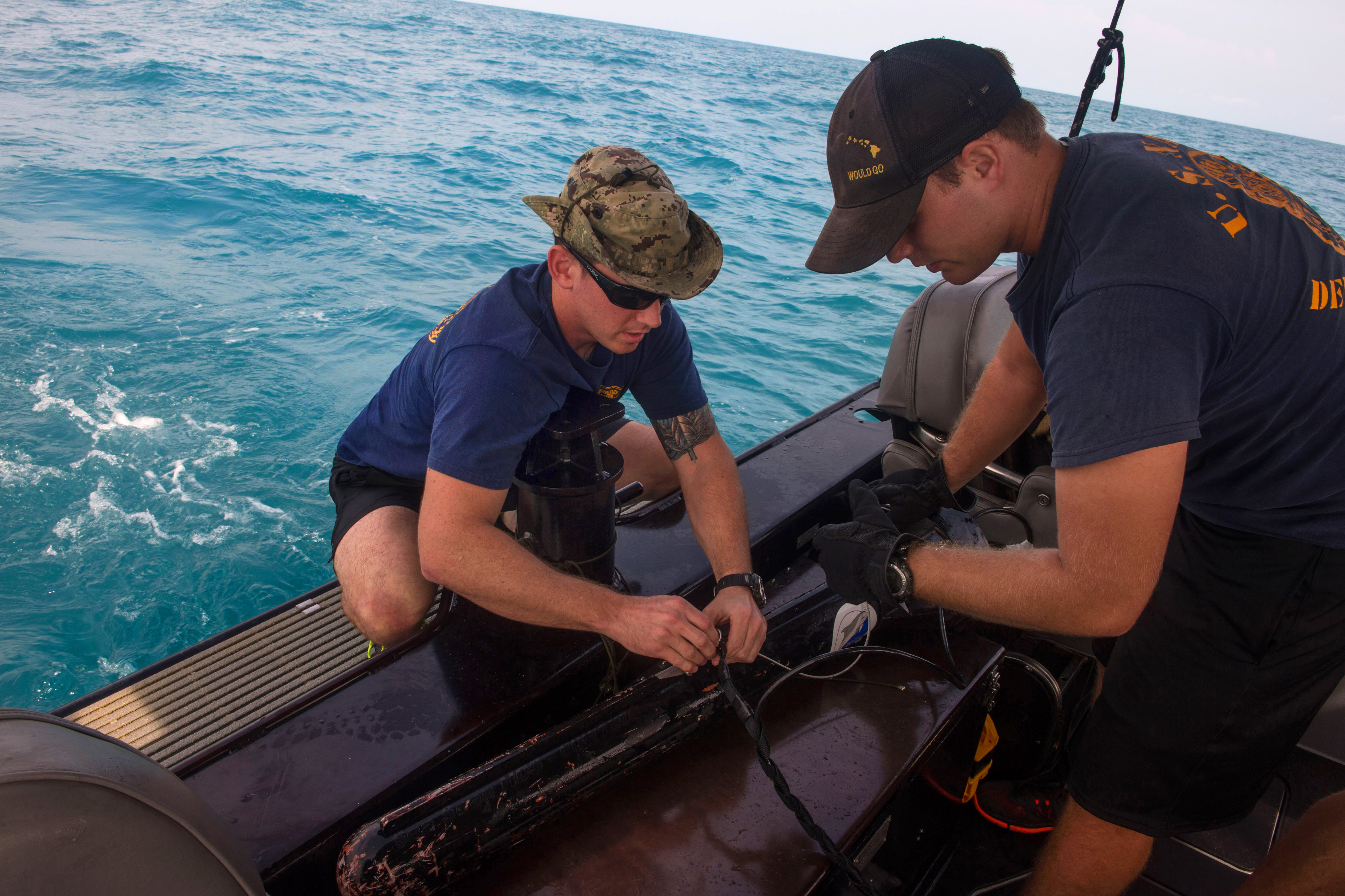 U S Navy Petty Officers 2nd Class Daniel Clarke left and Daniel