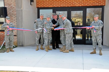 Army Maj. Gen. Jessica Wright, the adjutant general of the Pennsylvania National Guard, and others cut the ribbon at the Chambersburg Readiness Center on March 11, 2010. Although many of the centers were complete before then, Chambersburg was the first to celebrate its opening after the return of the 56th Stryker Brigade from its deployment to Iraq.