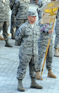 Senior Master Sgt. Mark Miller, first sergeant for the 380th Expeditionary Force Support Squadron, participates in a retreat ceremony at a non-disclosed base in Southwest Asia on April 2, 2010. Miller is deployed from the 133rd Test Squadron at Fort Dodge, Iowa, which is a geographically-separated unit of the 185th Air Refueling Wing in Sioux City, Iowa.