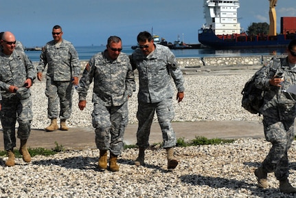 Army Maj. Gen. Simeon Trombitas, deputy commanding general of JTF-Haiti, walks off the landing zone at Fob White Falcon with Army Maj. Gen. Bennett Landreneau, the adjutant general of the Louisiana National Guard, during Landreneau's visit to Haiti, April 14, 2010. Landreneau will be in charge of New Horizon projects beginning this month, Army Lt. Gen. Ken Keen, the deputy commander of U.S. Southern Command, announced April 19, 2010.