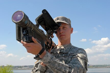 Pfc. Trevor Gaston, a Soldier with the 2nd Battalion, 263rd Air Defense Artillery, demonstrates an FIM-92 Stinger MANPADS (Man-Portable Air-Defense System) at Bolling Air Force Base April 14, 2010. Air Defense units from South Carolina and Ohio have been on rotating deployments to the National Capitol Region to support homeland defense as part of Operation Noble Eagle. This continued operation began in 2001, just days after--and in response to--the 9/11 terrorist attacks.