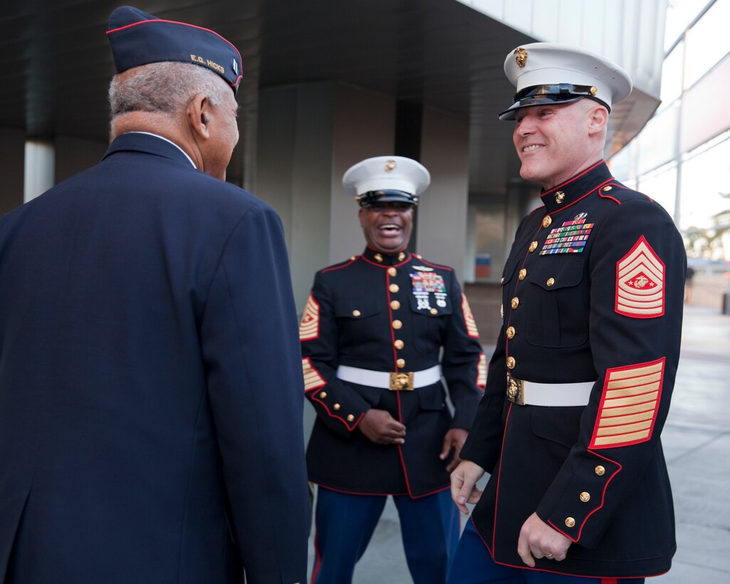 Sgt. Maj. Micheal P. Barrett, the 17th Sergeant Major of the Marine Corps, greets a Montford Point Marine at the 2015 Semper Fidelis All-American Bowl, at the StubHub Center, Carson, Calif., on Jan. 4, 2015. (U.S. Marine Corps photo by Lance Cpl. Samantha K. Draughon/ Released)