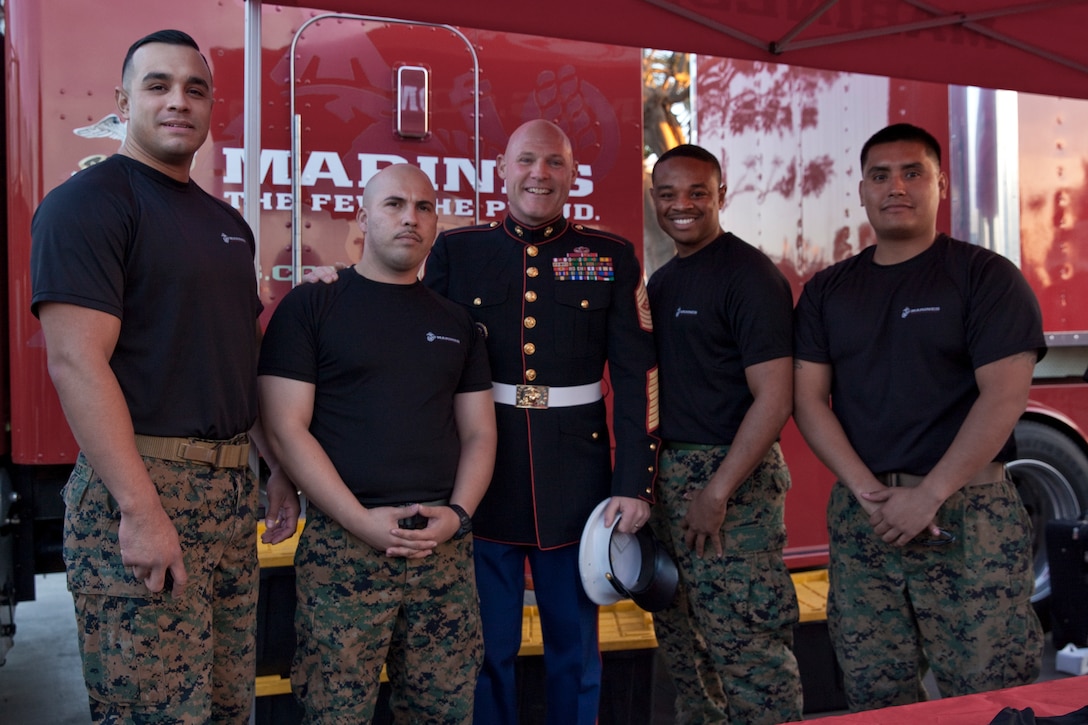 Sgt. Maj. Micheal P. Barrett, the 17th Sergeant Major of the Marine Corps, speaks with Marines and civilians before the 2015 Semper Fidelis All-American Bowl, at the StubHub Center, Carson, Calif., on Jan. 4, 2015. (U.S. Marine Corps photo by Lance Cpl. Samantha K. Draughon/ Released)