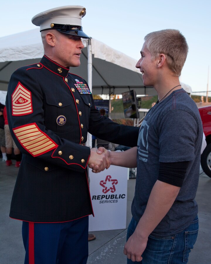 Sgt. Maj. Micheal P. Barrett, the 17th Sergeant Major of the Marine Corps, speaks with Marines and civilians before the 2015 Semper Fidelis All-American Bowl, at the StubHub Center, Carson, Calif., on Jan. 4, 2015. (U.S. Marine Corps photo by Lance Cpl. Samantha K. Draughon/ Released)