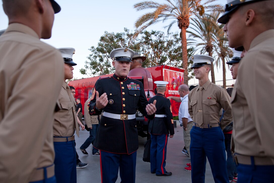 Sgt. Maj. Micheal P. Barrett, the 17th Sergeant Major of the Marine Corps, speaks with Marines and civilians before the 2015 Semper Fidelis All-American Bowl, at the StubHub Center, Carson, Calif., on Jan. 4, 2015. (U.S. Marine Corps photo by Lance Cpl. Samantha K. Draughon/ Released)