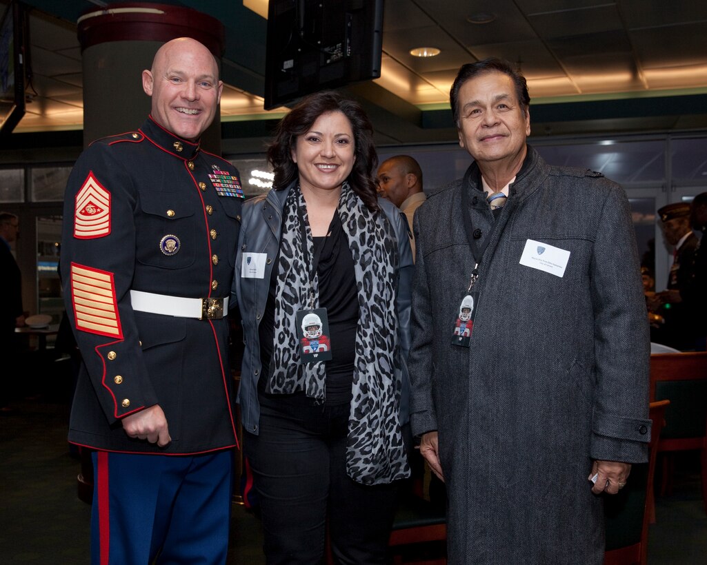 Sgt. Maj. Micheal P. Barrett, the 17th Sergeant Major of the Marine Corps, speaks with Marines and civilians before the 2015 Semper Fidelis All-American Bowl, at the StubHub Center, Carson, Calif., on Jan. 4, 2015. (U.S. Marine Corps photo by Lance Cpl. Samantha K. Draughon/ Released)