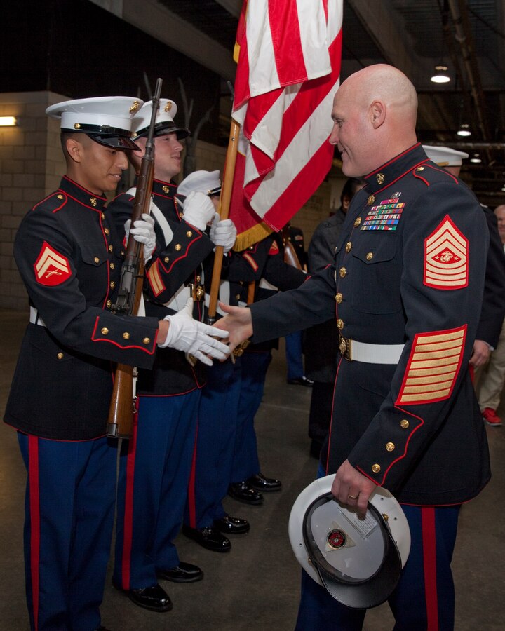 Sgt. Maj. Micheal P. Barrett, the 17th Sergeant Major of the Marine Corps, speaks with the Marine Corps color guard at the 2015 Semper Fidelis All-American Bowl, at the StubHub Center, Carson, Calif., on Jan. 4, 2015. (U.S. Marine Corps photo by Lance Cpl. Samantha K. Draughon/ Released)