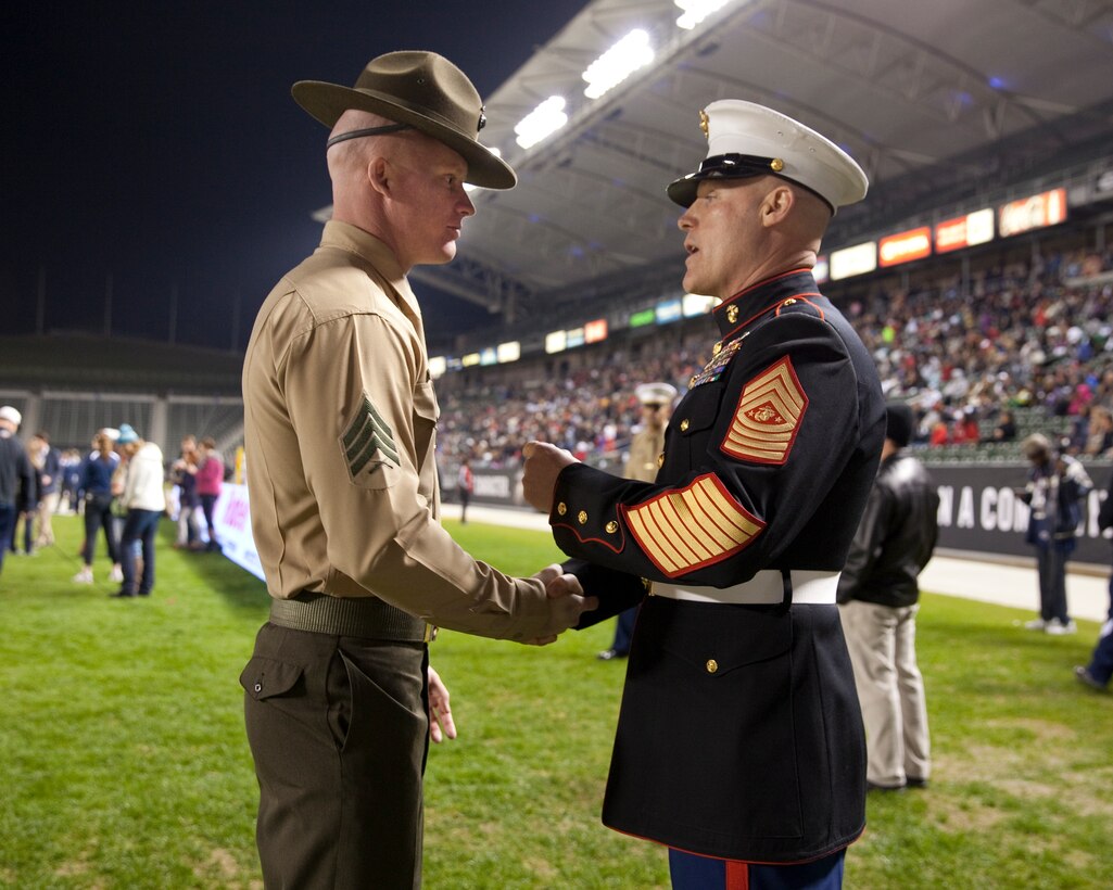 Sgt. Maj. Micheal P. Barrett, the 17th Sergeant Major of the Marine Corps, speaks with Drill Instructors at the 2015 Semper Fidelis All-American Bowl, at the StubHub Center, Carson, Calif., on  Jan. 4, 2015. (U.S. Marine Corps photo by Lance Cpl. Samantha K. Draughon/ Released)