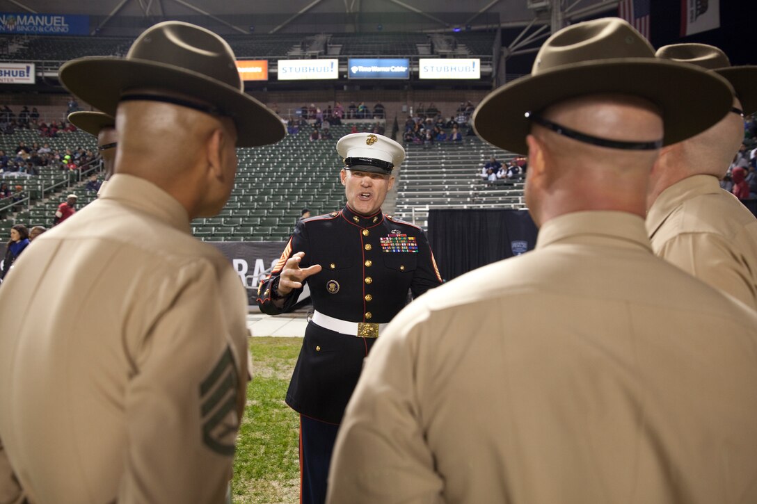 Sgt. Maj. Micheal P. Barrett, the 17th Sergeant Major of the Marine Corps, speaks with Drill Instructors at the 2015 Semper Fidelis All-American Bowl, at the StubHub Center, Carson, Calif., on  Jan. 4, 2015. (U.S. Marine Corps photo by Lance Cpl. Samantha K. Draughon/ Released)
