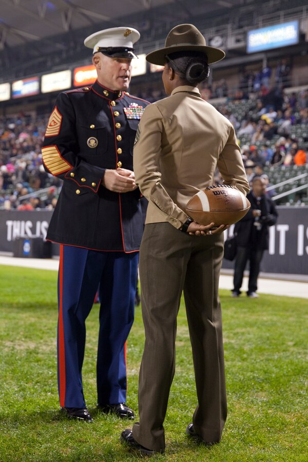 Sgt. Maj. Micheal P. Barrett, the 17th Sergeant Major of the Marine Corps, speaks with Drill Instructors at the 2015 Semper Fidelis All-American Bowl, at the StubHub Center, Carson, Calif., on  Jan. 4, 2015. (U.S. Marine Corps photo by Lance Cpl. Samantha K. Draughon/ Released)