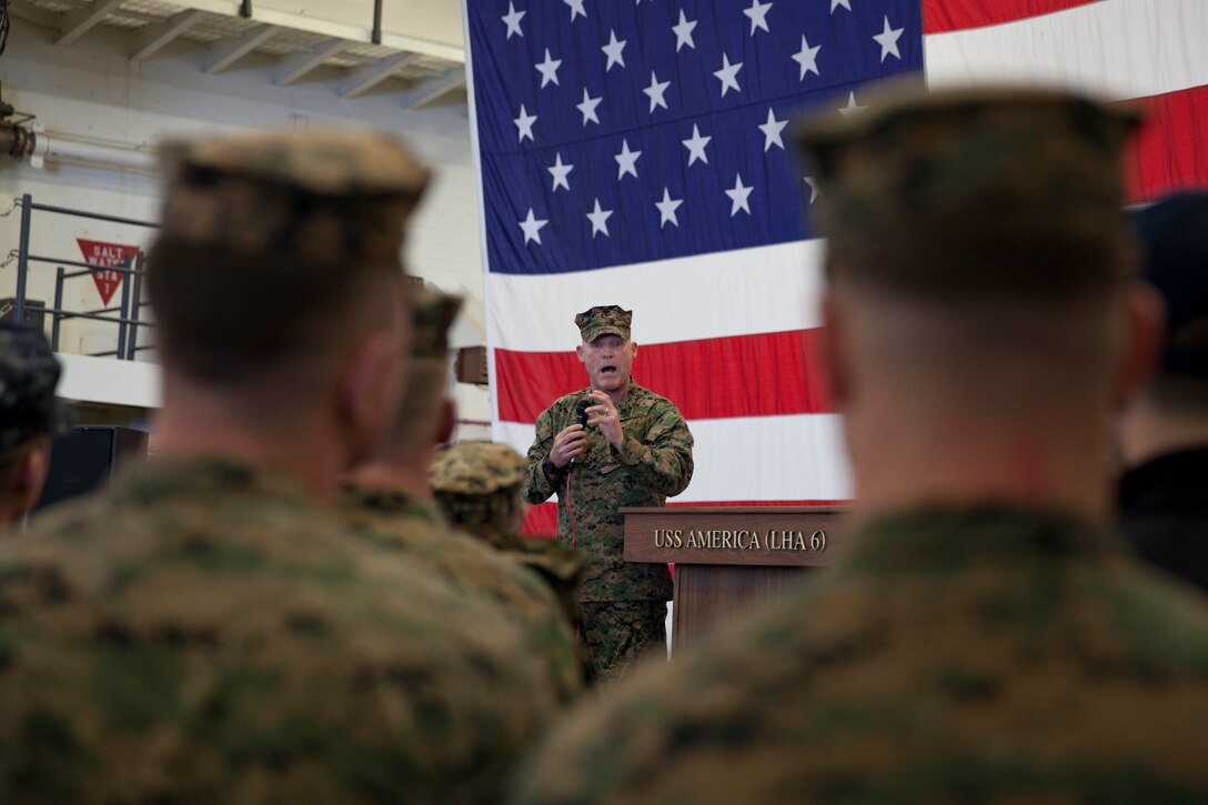 Sgt. Maj. Micheal P. Barrett, the 17th Sergeant Major of the Marine Corps, speaks to Marines and Sailors aboard the USS America (LHA-6), at Naval Base San Diego, Calif., on Jan. 5, 2015. (U.S. Marine Corps photo by Lance Cpl. Samantha K. Draughon/ Released)