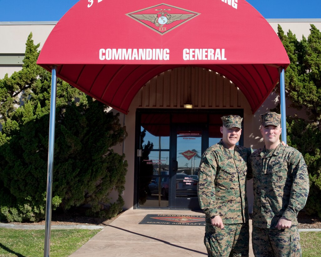 Sgt. Maj. Micheal P. Barrett, the 17th Sergeant Major of the Marine Corps, stands with a Marine on Marine Corps Air Station Miramar, Calif., on Jan. 5, 2015. (U.S. Marine Corps photo by Lance Cpl. Samantha K. Draughon/ Released)