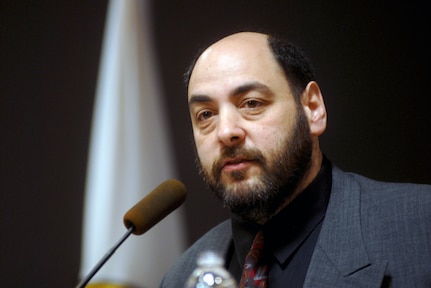 Dr. Greg Robinson, associate professor of history at L'Université du Quebec à
Montréal, spoke at a Day of Remembrance ceremony at the Army National Guard
Readiness Center in Arlington, Va., April 15, 2010. Robinson spoke to a room
of Soldiers and military civilians about the Holocaust and the horrible
crimes that were committed during that time. He emphasized that not only Jews
were systematically killed, but also Poles, Russians, the disabled,
homosexuals and religious groups.